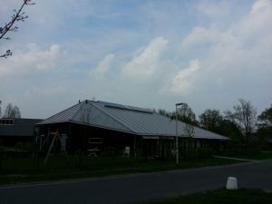 Blauwe zonnepanelen geplaatst aan gevel te Emmen in oktober 2013 Blauwe zonnepanelen geplaatst aan gevel te Emmen in oktober 2013
